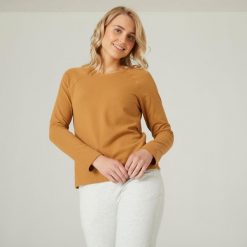 Koszulka z długim rękawem damska Domyos Gym & Pilates 500. Brązowe bluzki damskie DOMYOS, l, bez wzorów, z bawełny, sportowe, bez kołnierzyka, bez ramiączek. W wyprzedaży za 39.99 zł.