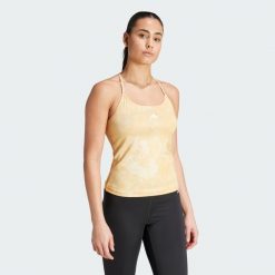 Top Train Essentials AOP Flower Tie-Dye Tank. Żółte bluzki damskie Adidas, l, bez wzorów, z materiału, sportowe, bez kołnierzyka, bez ramiączek. Za 139.00 zł.