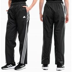 Adidas spodnie dresowe damskie sportowe treningowe Future Icons. Czarne obuwie sportowe damskie Adidas, bez wzorów, z dresówki, sportowe. Za 229.99 zł.