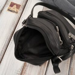 Paolo Peruzzi Saszetka męska na ramię skórzana mała czarna T-133-BL. Czarne saszetki i nerki męskie Paolo Peruzzi, bez wzorów. Za 144.19 zł.