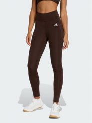 Adidas Legginsy Optimé Essentials Stash JZ0824 Brązowy Slim Fit. Brązowe legginsy damskie Adidas, xs, bez wzorów, na fitness i siłownię. Za 199.99 zł.