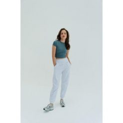 Koszulka treningowa do jogi Moonholi Timeless z krótkim rękawem. Szare koszulki sportowe damskie MOONHOLI, m, bez wzorów, bez ramiączek, na fitness i siłownię. Za 189.00 zł.