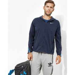Nike Kurtka Impossibly Light Jkt Hooded , granatowy, rozmiar L. Niebieskie kurtki męskie Nike, l, bez wzorów, z nylonu, bez kaptura. W wyprzedaży za 199.99 zł.
