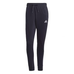 Spodnie męskie adidas Essentials Single. Białe spodnie sportowe męskie Adidas, m, bez wzorów, do biegania. Za 129.00 zł.