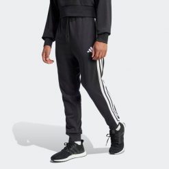 Spodnie dresowe męskie ADIDAS Gym & Pilates. Spodnie materiałowe męskie Adidas, m, bez wzorów, z bawełny, na fitness i siłownię. Za 219.99 zł.