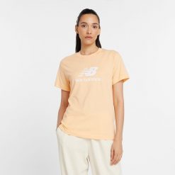 Koszulka damska New Balance WT41502PAE – pomarańczowa. Brązowe koszulki sportowe damskie New Balance, s, bez wzorów, z materiału, bez ramiączek. Za 69.99 zł.
