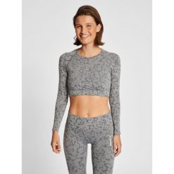 Damski bezszwowy crop top Hummel Mt Pi. Brązowe biustonosze Hummel, bez wzorów. Za 148.50 zł.