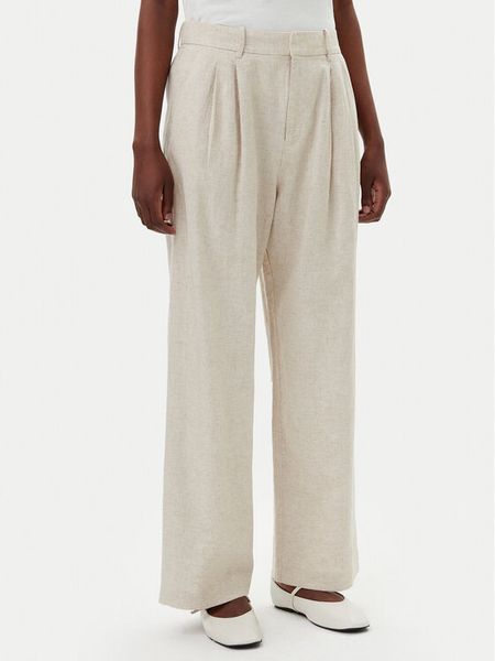 Gap Spodnie materiałowe 713998-03 Beżowy Wide Leg. Brązowe spodnie materiałowe damskie GAP, bez wzorów, z materiału. Za 259.99 zł.