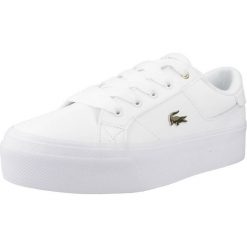 Tenisówki Lacoste Model Ziane Kolor Biały. Białe trampki i tenisówki damskie Lacoste, bez wzorów, bez zapięcia. Za 399.00 zł.