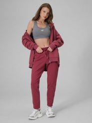 4F Spodnie dresowe damskie - burgundowe XXL. Czerwone spodnie dresowe damskie 4F, bez wzorów, z bawełny. Za 139.99 zł.