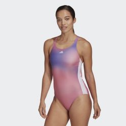 Strój kąpielowy damski Adidas Melbourne jednoczęściowy sportowy. Białe stroje kąpielowe damskie Adidas, xs, bez wzorów, z elastanu. Za 123.00 zł.