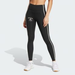 Legginsy Optime Heritage Full-Length. Białe legginsy damskie Adidas, bez wzorów, z materiału. Za 299.00 zł.