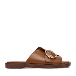 Klapki U.S. Polo Assn. Brązowe klapki damskie U.S. Polo Assn., bez wzorów, marine, bez obcasa, bez zapięcia. Za 229.99 zł.