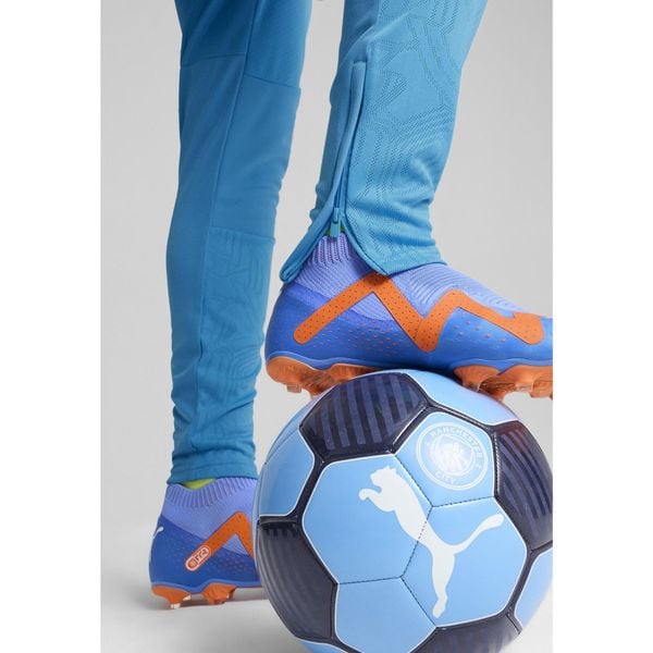 Męskie spodnie treningowe Manchester City PUMA Magic Blue Yellow Glow. Niebieskie spodnie sportowe męskie Puma, m, bez wzorów, do piłki nożnej. W wyprzedaży za 255.10 zł.