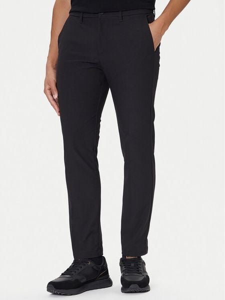 BOSS Spodnie materiałowe T_Commuter 50544245 Czarny Slim Fit. Czarne spodnie materiałowe męskie Boss, bez wzorów, z materiału. Za 339.99 zł.