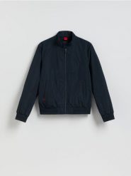 Kurtka bomberka ze stójką - granatowy. Niebieskie kurtki męskie Reserved, l, bez wzorów, z tkaniny, bez kaptura. Za 199.99 zł.