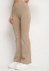 Beżowe Legginsy Typu Dzwony z Wysokim Stanem Orralise. Brązowe legginsy damskie Born2be, bez wzorów, z jeansu. Za 44.99 zł.