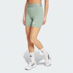Krótkie legginsy TECHFIT. Zielone legginsy damskie Adidas, bez wzorów, z materiału. Za 129.00 zł.