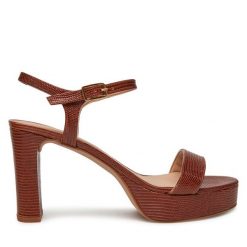 Sandały Unisa. Brązowe sandały damskie Unisa, bez wzorów, bez obcasa, na słupku, bez zapięcia. Za 479.99 zł.