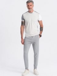 Ombre Męskie spodnie dresowe typu jogger - szare V8 OM-PABS-0173 M. Szare spodnie sportowe męskie Ombre, m, bez wzorów, z dresówki. Za 89.99 zł.