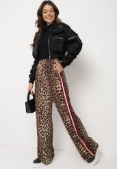 Brązowo-Czerwone Szerokie Spodnie w Panterkę z Wiskozą i Gumką w Talii Ozdobione Lampasami Velonara. Brązowe spodnie materiałowe damskie Born2be, bez wzorów, z jeansu, eleganckie, z podwyższonym stanem. Za 109.99 zł.