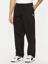 Puma Spodnie materiałowe Better Classics 624259 Czarny Relaxed Fit. Czarne spodnie materiałowe męskie Puma, bez wzorów, z bawełny. Za 179.99 zł.