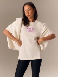 4F T-shirt loose z nadrukiem damski - biały L. Brązowe t-shirty damskie 4F, l, bez wzorów, z materiału, eleganckie, bez kołnierzyka, bez ramiączek. Za 79.99 zł.