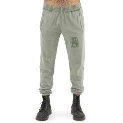 Spodnie dresowe z bawełna z kieszenie na co dzień. Zielone spodnie materiałowe męskie LEONE 1947 APPAREL, bez wzorów, z bawełny, na fitness i siłownię. W wyprzedaży za 164.19 zł.