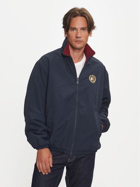 Tommy Jeans Kurtka przejściowa DM0DM19643 Granatowy Regular Fit. Niebieskie kurtki męskie Tommy Jeans, m, bez wzorów, z jeansu, bez kaptura. Za 479.99 zł.