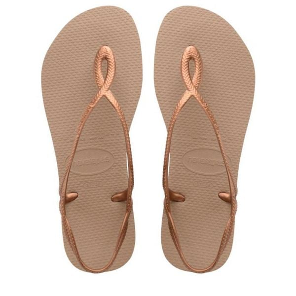 Klapki Havaianas Model 4129697 Kolor Brązowy. Czerwone klapki damskie Havaianas, bez wzorów, z gumy, sportowe, bez obcasa, bez zapięcia. Za 148.35 zł.