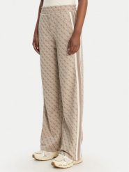 Guess Spodnie dresowe V6GB04 K2955 Beżowy Regular Fit. Brązowe spodnie sportowe damskie Guess, z aplikacjami, z dresówki. Za 519.99 zł.