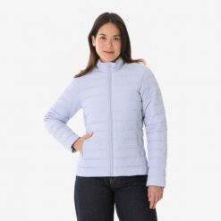 Kurtka turystyczna zimowa damska Quechua MH100. Fioletowe kurtki sportowe damskie QUECHUA, na zimę, l, bez wzorów, z materiału, bez ramiączek, bez kaptura, tenisowe. Za 119.99 zł.