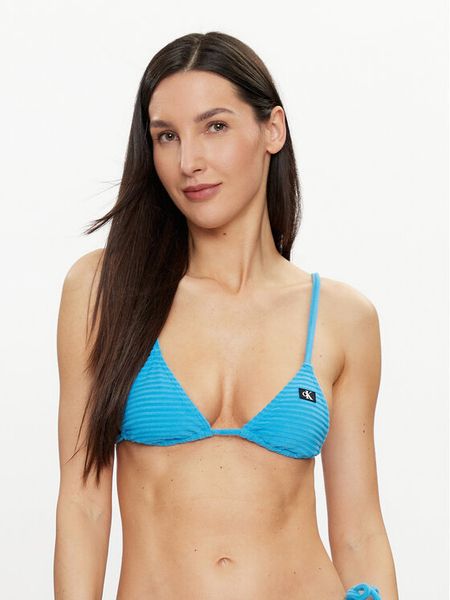 Calvin Klein Swimwear Góra od bikini KW0KW02468 Niebieski. Niebieskie bikini Calvin Klein Swimwear, bez wzorów, z syntetyku. Za 149.99 zł.