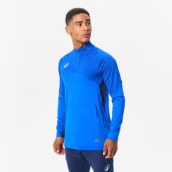 Bluza piłkarska Kipsta CLR Club na krótki suwak. Niebieskie bluzy męskie KIPSTA, l, bez wzorów, z materiału, sportowe, bez ramiączek, bez kaptura. Za 139.99 zł.