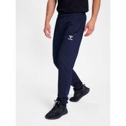 Spodnie do biegania Hummel Go 2.0. Niebieskie spodnie sportowe męskie Hummel, bez wzorów, z bawełny, do biegania. Za 193.50 zł.