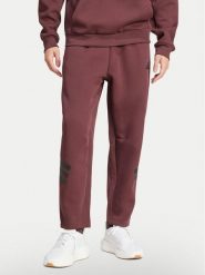 Adidas Spodnie dresowe Future Icons 3-Stripes JD4888 Bordowy Loose Fit. Czerwone spodnie sportowe męskie Adidas, l, bez wzorów, z bawełny. Za 259.99 zł.