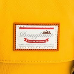 Plecak Doughnut. Żółte plecaki męskie Doughnut, bez wzorów. Za 289.99 zł.