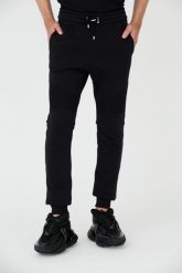 BALMAIN Czarne spodnie dresowe RIbbed Flock Sweatpants. Czarne spodnie sportowe męskie Balmain, m, bez wzorów, z dresówki. W wyprzedaży za 2,199.99 zł.