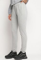 Jasnoszare Spodnie Dresowe z Gumką w pasie i Troczkiem Halemia. Szare spodnie dresowe damskie Born2be, bez wzorów, z dresówki, eleganckie, długie. Za 39.99 zł.
