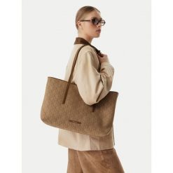 Torebka Calvin Klein. Brązowe shopperki damskie Calvin Klein, bez wzorów, bez dodatków. Za 649.99 zł.