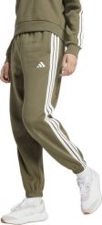 Adidas Spodnie damskie adidas Essentials 3-Stripes Fleece Loose-Fit oliwkowe JX7698 S. Zielone spodnie dresowe damskie Adidas, bez wzorów, sportowe. Za 237.16 zł.