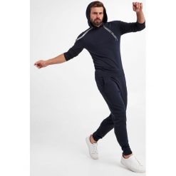 Spodnie dresowe JOOP! JEANS. Spodnie sportowe męskie JOOP! Jeans, l, bez wzorów, z dresówki. W wyprzedaży za 465.57 zł.