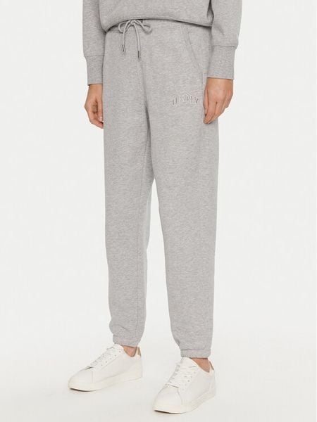 DKNY Sport Spodnie dresowe DP4P3471 Szary Regular Fit. Szare spodnie dresowe damskie DKNY Sport, bez wzorów, z bawełny, sportowe. Za 189.99 zł.