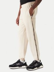 EA7 Emporio Armani Spodnie dresowe 7M001482 AF12660 U1088 Beżowy Regular Fit. Brązowe spodnie sportowe męskie EA7 Emporio Armani, m, bez wzorów, z dresówki. Za 509.99 zł.