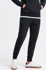 Ombre Bawełniane spodnie męskie dresowe joggery BASIC czarne V9 OM-PABS-0174 S. Czarne spodnie sportowe męskie Ombre, m, bez wzorów, z bawełny. Za 129.99 zł.