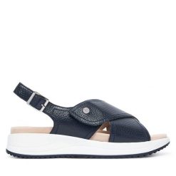 Sandały Caprice. Niebieskie sandały damskie Caprice, bez wzorów, bez obcasa, na płaskiej podeszwie, bez zapięcia. Za 399.99 zł.