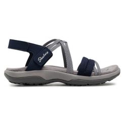 Sandały Skechers. Niebieskie sandały damskie Skechers, bez wzorów, bez obcasa, na płaskiej podeszwie, bez zapięcia. Za 269.99 zł.