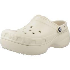 Klapki Crocs Model Lined Clog Kolor Beżowy. Białe klapki damskie Crocs, bez wzorów, z gumy, bez obcasa, bez zapięcia. Za 301.15 zł.