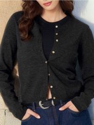 Kardigan - czarny. Czarne kardigany damskie Sinsay, l, bez wzorów, bez kołnierzyka. Za 39.99 zł.