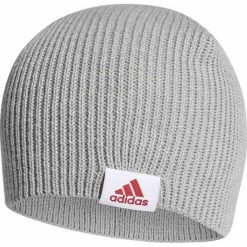 CZAPKA ZIMOWA ADIDAS BEANIE (DAMSKA). Szare czapki damskie Adidas, na zimę, bez wzorów, z dzianiny. Za 59.99 zł.